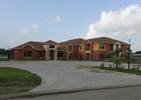 The Red Rose Of Texas Apartments