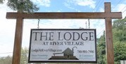 The Lodge at River Village Apartments