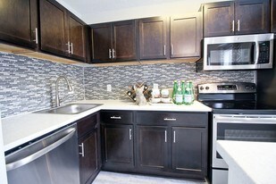 Infinity at Plaza West Apartments