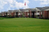 Building Photo - The Greens at Auburn Apartments in Auburn, Alabama