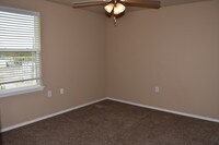 Building Photo - Woodlands at Creekside Apartments in Bentonville, Arkansas