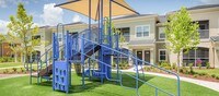 Building Photo - Colonial Grand at Randal Lakes Apartments in Orlando, Florida