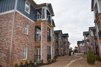 Building Photo - Woodland Park at the Grove Apartments in Rogers, Arkansas