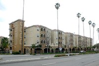 Building Photo - The Palms on University Apartments in Riverside, California