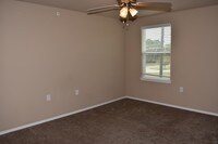 Building Photo - Woodlands at Creekside Apartments in Bentonville, Arkansas