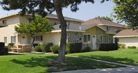Building Photo - Whispering Woods Apartments in Modesto, California