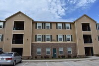 Building Photo - Woodlands at Creekside Apartments in Bentonville, Arkansas