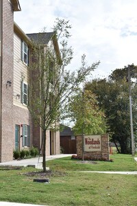 Building Photo - Woodlands at Creekside Apartments in Bentonville, Arkansas