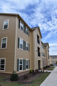Building Photo - Woodlands at Creekside Apartments in Bentonville, Arkansas