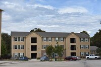 Building Photo - Woodlands at Creekside Apartments in Bentonville, Arkansas