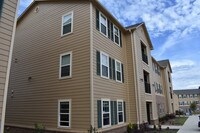 Building Photo - Woodlands at Creekside Apartments in Bentonville, Arkansas