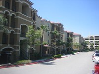 Building Photo - The Palms on University Apartments in Riverside, California